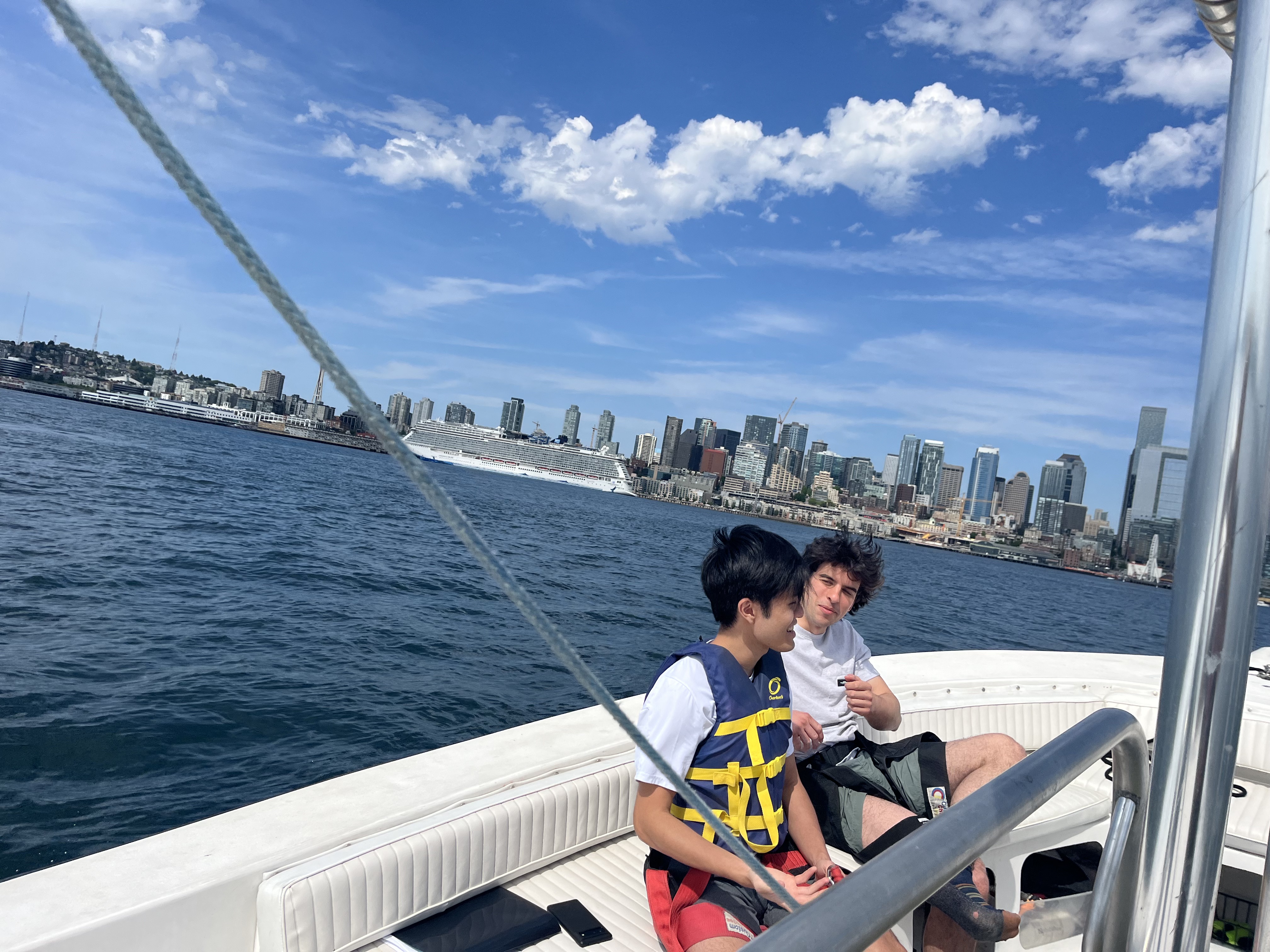 Two guests relaxing on the boat before their flight